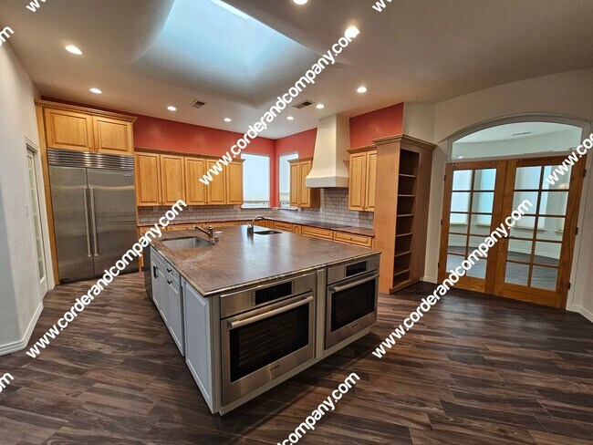 Building Photo - Welcome to this stunning 4 Bedroom, 3 Bath...