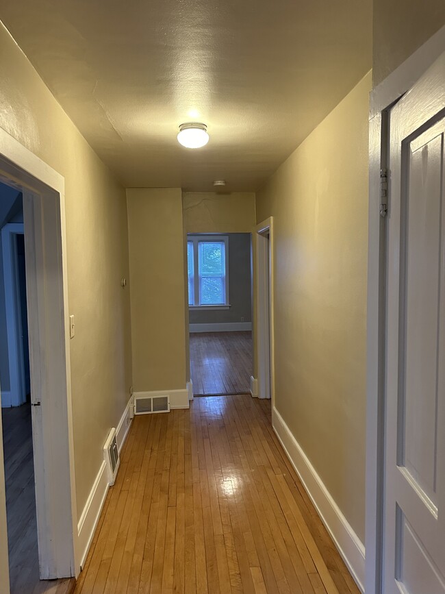 Hallway to pic from 11-15-24bedrooms and living room - 1618 N 6th St