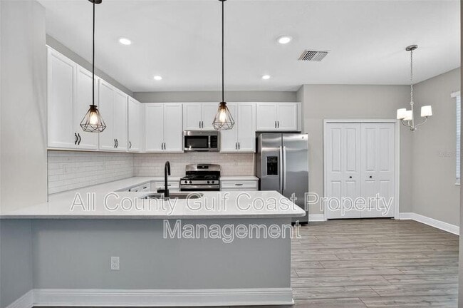 Building Photo - 8132 Tea Olive Ter