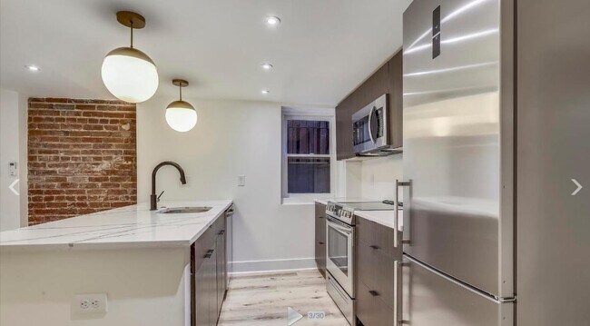 Foto del edificio - 1855 Mintwood Pl NW