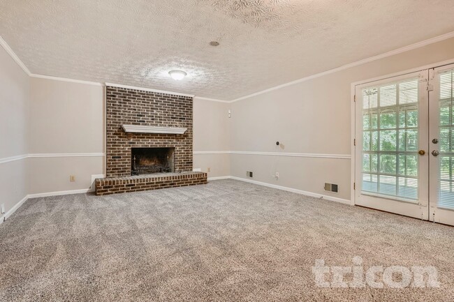 Building Photo - 305 Woodsong Dr