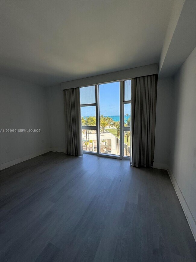 Building Photo - 10275 Collins Ave