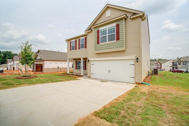 Building Photo - New Construction -- 4 BR, 2.5 BA., 2 Car G...
