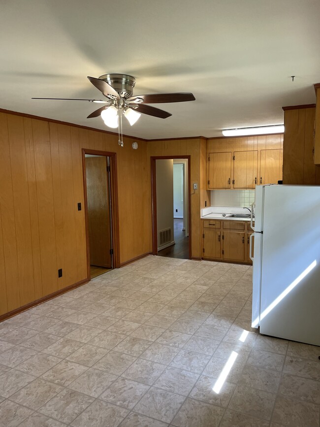Kitchen. Living room to the left. Bedrooms and bath through the right door - 2803 Winters Dr