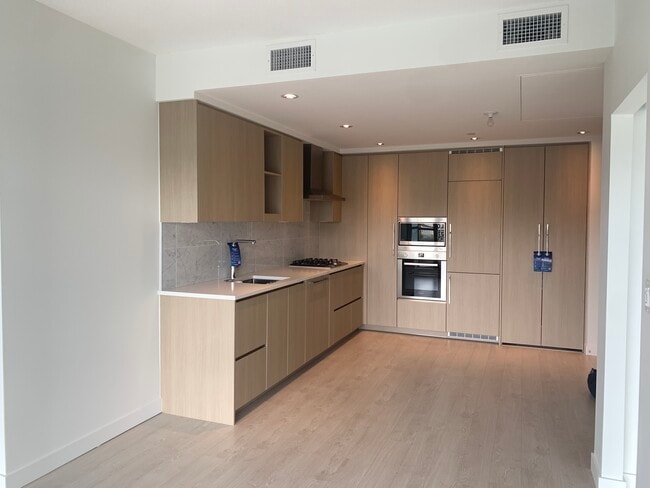 Building Photo - 406-4730 Lougheed Highway