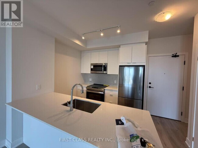 Photo du bâtiment - 430 Square One Dr