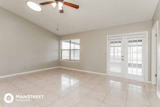 Building Photo - 7009 Swamp Flower Dr N