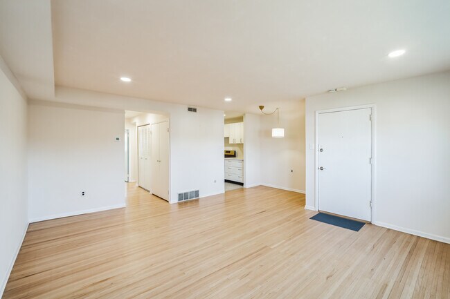 Living room looking into kitchen/dining area - 6901 Valley Ave
