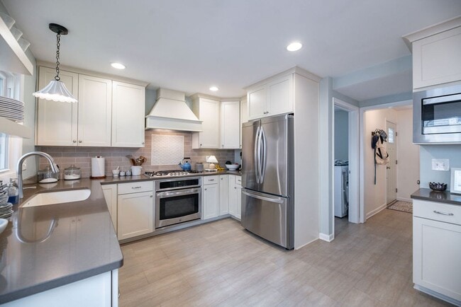 Building Photo - Updated Beachwood Ranch with Stunning Kitchen & Expansive Living Spaces