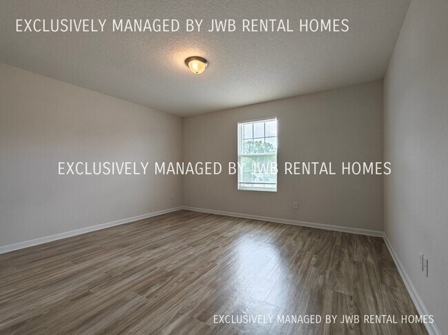 Building Photo - 8498 McGirts Village Ln
