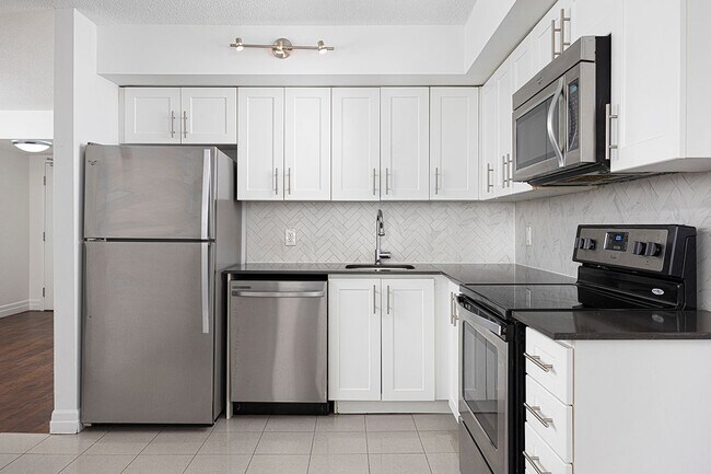 Photo du bâtiment - 297 Queens Ave