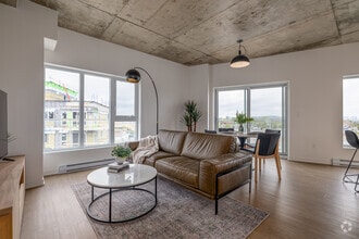 1BR, 1BA - 1010SF - Living Room - Le Celtis