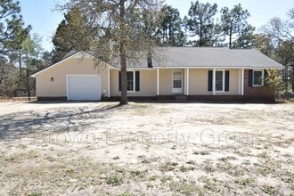 Building Photo - 6901 Woodmark Dr