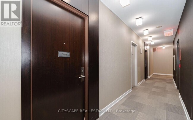 Photo du bâtiment - 50 Absolute Ave