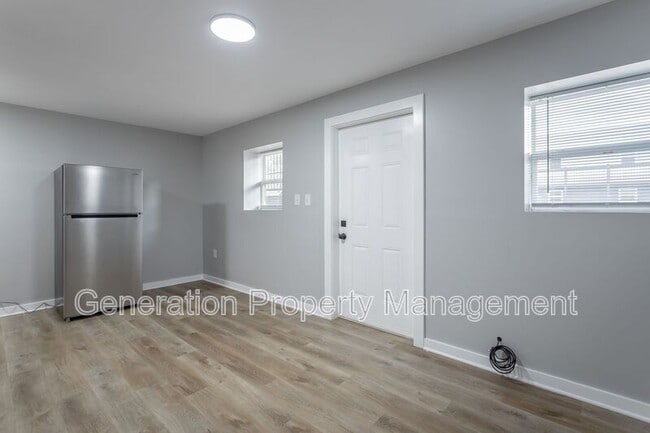 Building Photo - Genesis Apartments 2