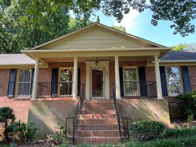Building Photo - Four Bedroom Brick Home in Denver with finished basement and Seasonal Lake Views!