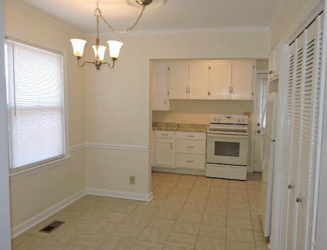Dining Room, Laundry Closet and Kitchen - 5652 Obrien Ave