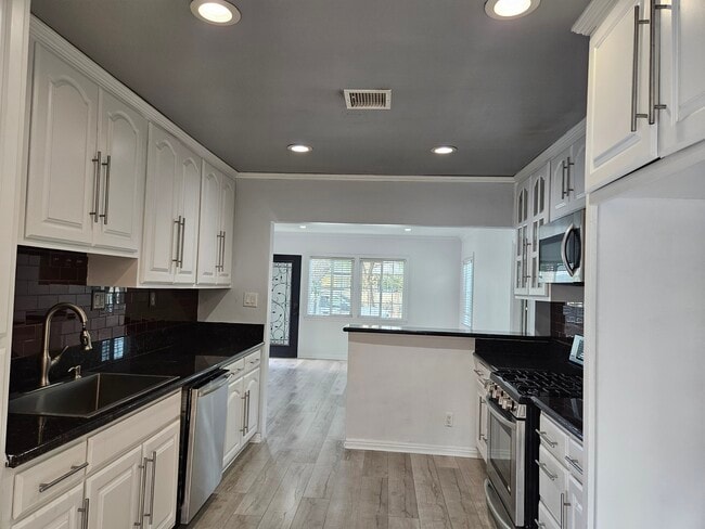 Building Photo - 8030 Lemona Ave