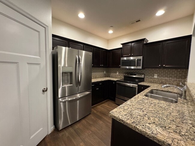 Building Photo - Spectacular Townhouse!  "ASK ABOUT OUR ZER...