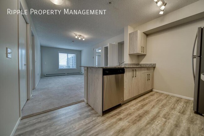 Photo du bâtiment - AMAZING 2 BEDS/ 2 BATHS + DEN CONDO | UNDERGROUND PARKING