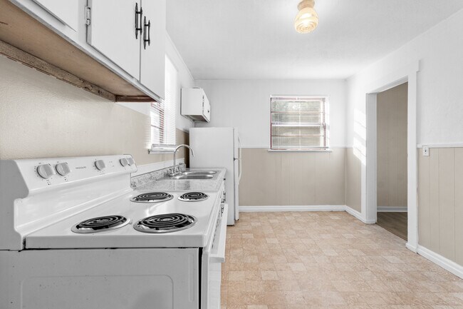 Lots of sunlight in the kitchen. All new windows throughout the home. - 110 Blackman St