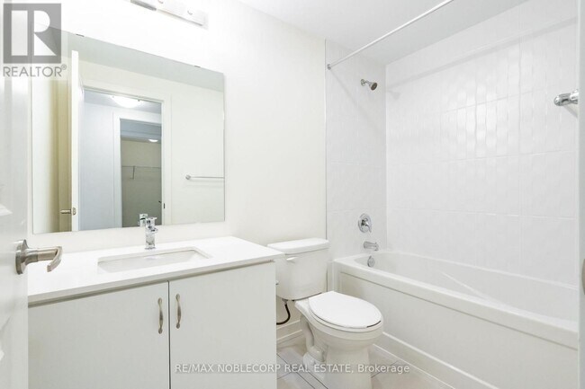 Photo du bâtiment - 58 Elizabeth St S