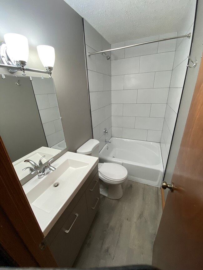 Upstairs full bath, completely remodeled. - 6387 15th St N