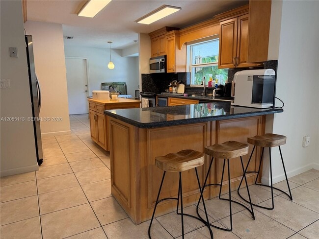 Building Photo - 5721 SW 59th Pl