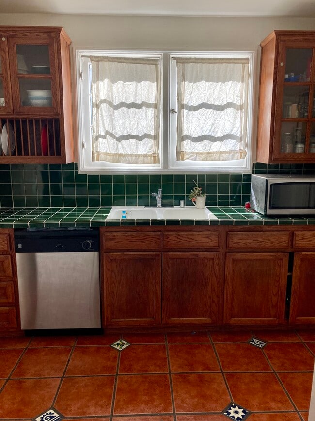 Wood enclosed cabinets in kitchen - 2423 St George St