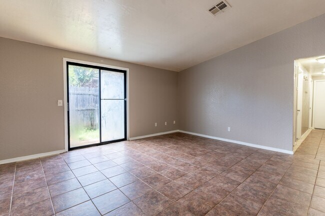 Building Photo - Stylishly Updated 4-Bedroom Home with Mode...