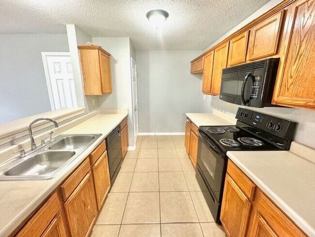 Building Photo - Now Leasing a 4-Bedroom 2 Bath Home In Cor...