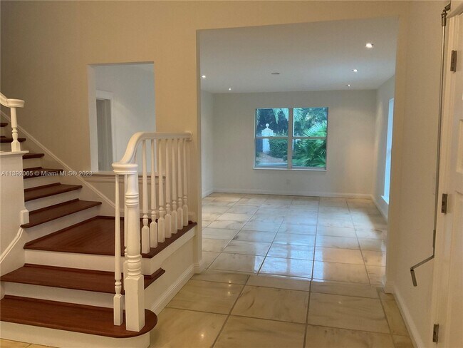 Building Photo - 4570 Sabal Palm Rd