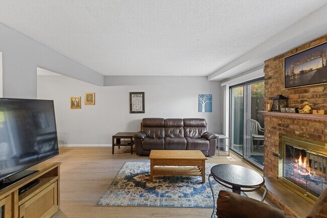 Sliders off of living room for easy entertaining - 4705 Cedar Lake Rd S