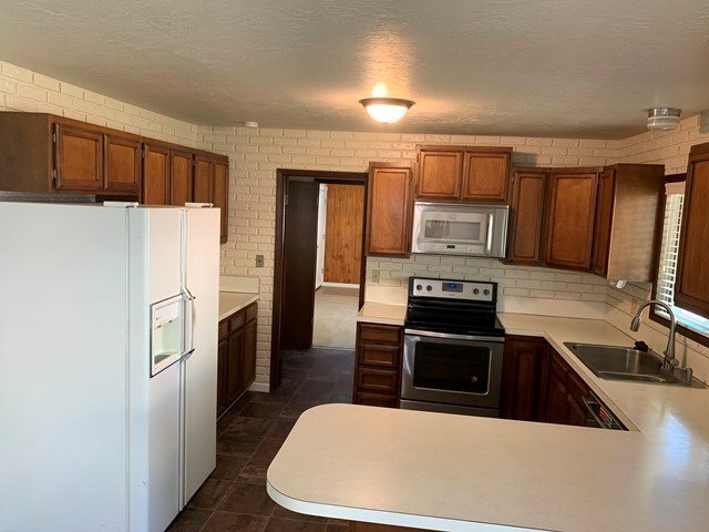 Building Photo - Great home in Moyina Heights