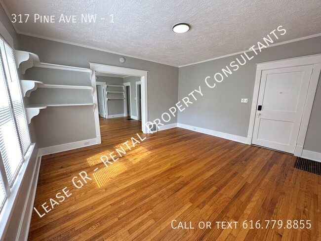 Building Photo - Updated lower 2 bedroom on the West side o...