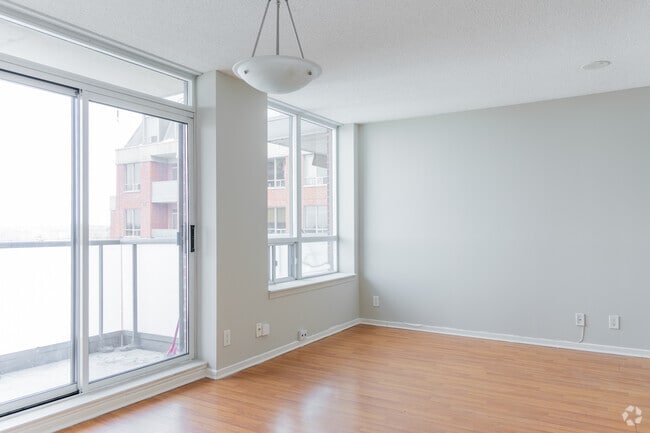 3BR, 2BA - 745SF - Living Room - The Landmarq Rental Residences