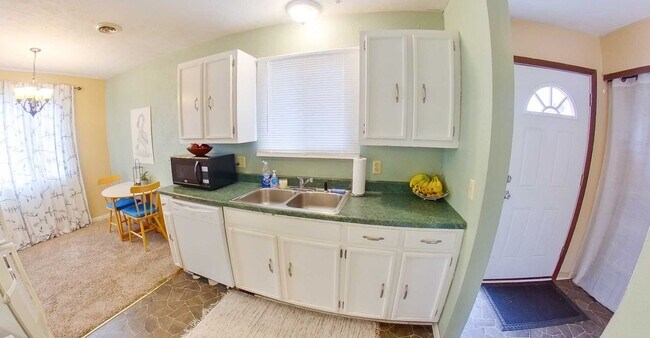 Building Photo - 3D Tour Available - Fenced-in Yard + Attac...