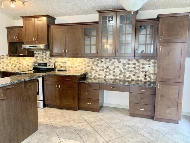 Photo du bâtiment - 4 bedroom in Grande Prairie AB T8W 2M8