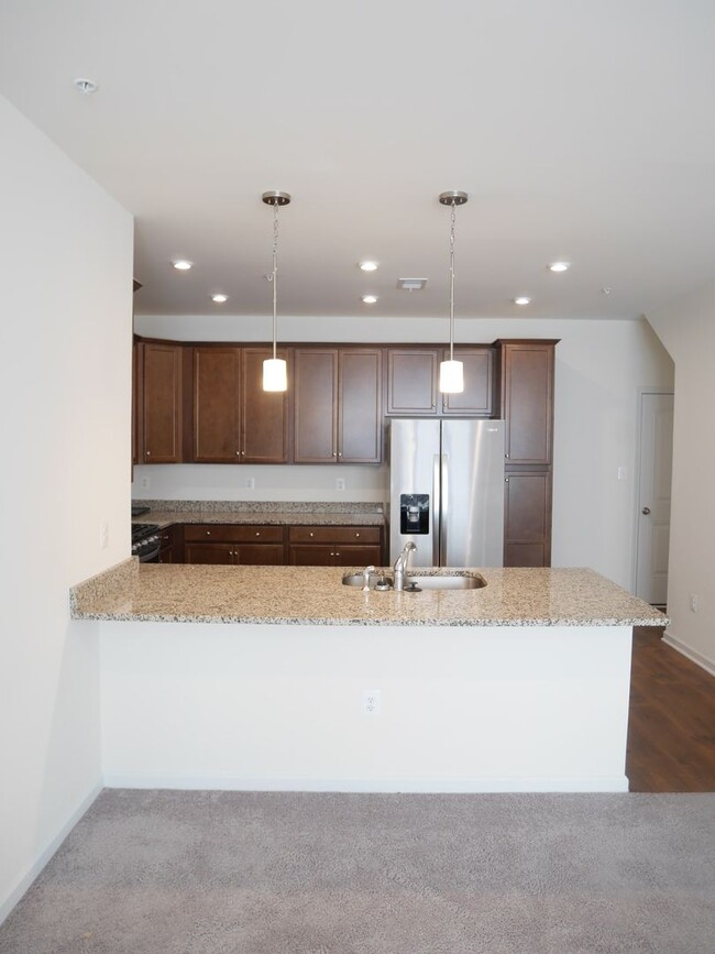 Building Photo - Two Year Old Luxury Condo: Move-in Ready L...