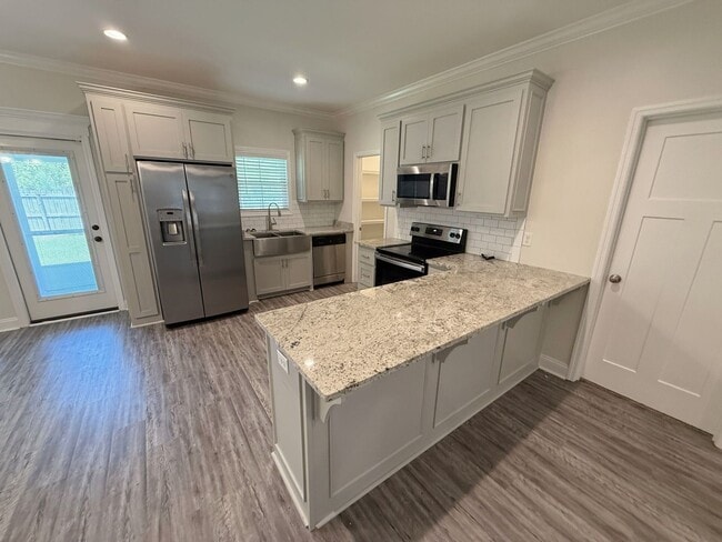 Building Photo - Stylish 4-Bedroom Home with Screened Porch...