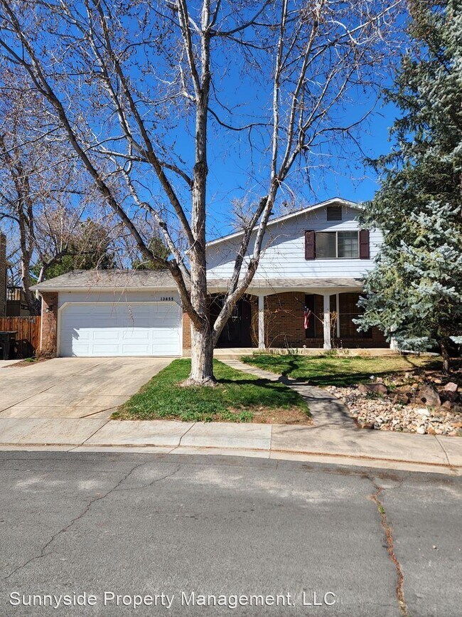 Foto del edificio - 4 br, 2.5 bath House - 13855 W 68th Dr.