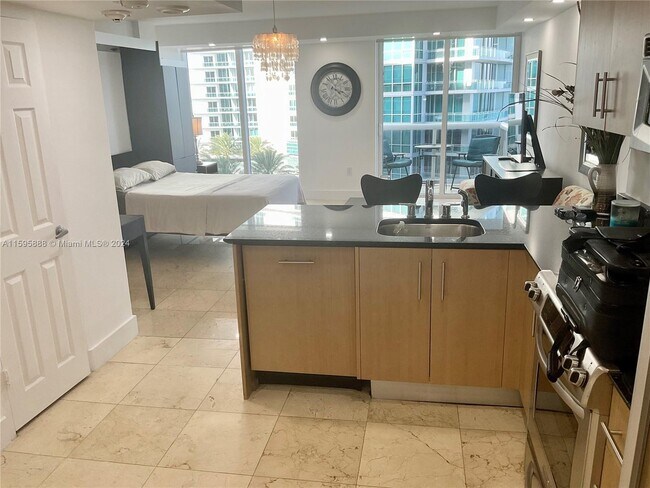Building Photo - 10275 Collins Ave