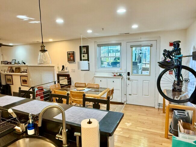 View from kitchen into dining room. - 1240 4th St NW