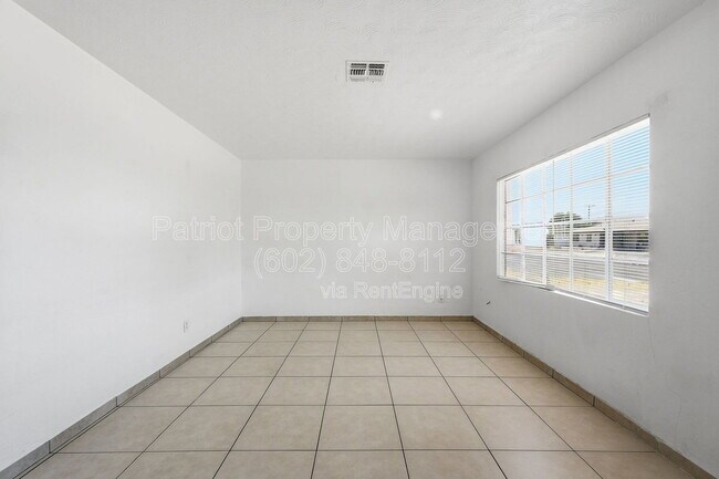 Building Photo - 6701 N 33rd Ave