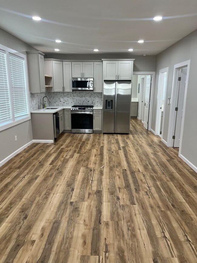 Photo - Split AC's In each room. Wet Bar. Spacious House