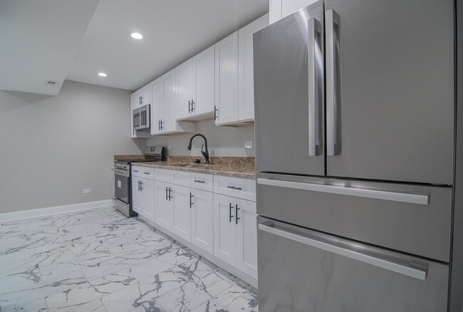 Building Photo - 1509 N Kostner Ave