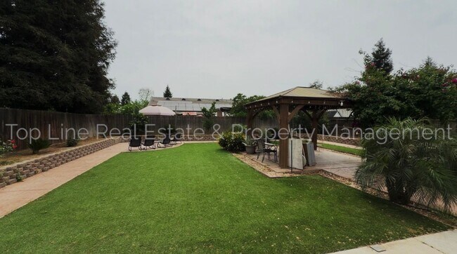 Building Photo - 3851 W Buena Vista Ave