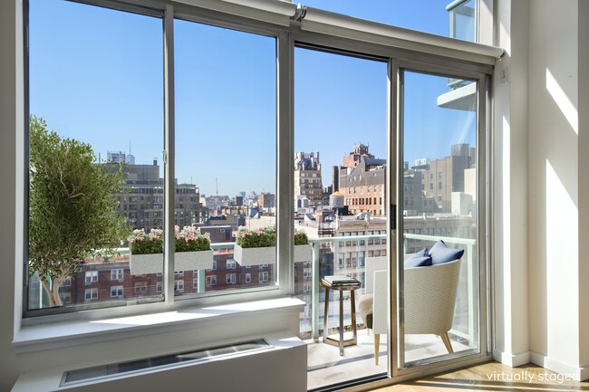 Building Photo - Sun-filled Duplex with Private Balcony