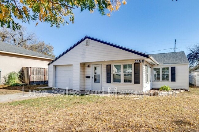 Building Photo - 1133 S Miles Ave
