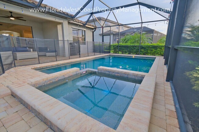 Foto del edificio - OUTSTANDING POLO RUN POOL HOME! 3 BEDROOMS...